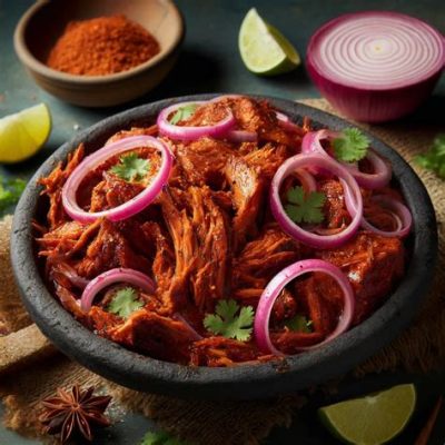  Cochinita Pibil:  A Symphony of Citrus and Smoke That Will Transport Your Taste Buds to Mayan Mystique!